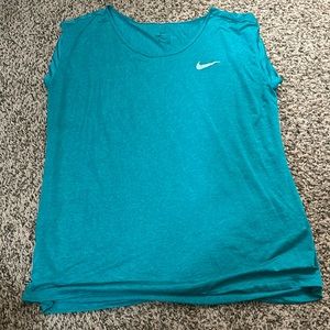 Sheer teal Nike running top. Size M.